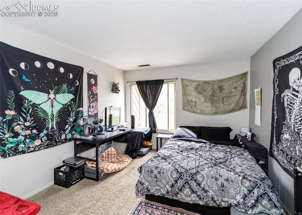 Image 30 of 36: Bedroom