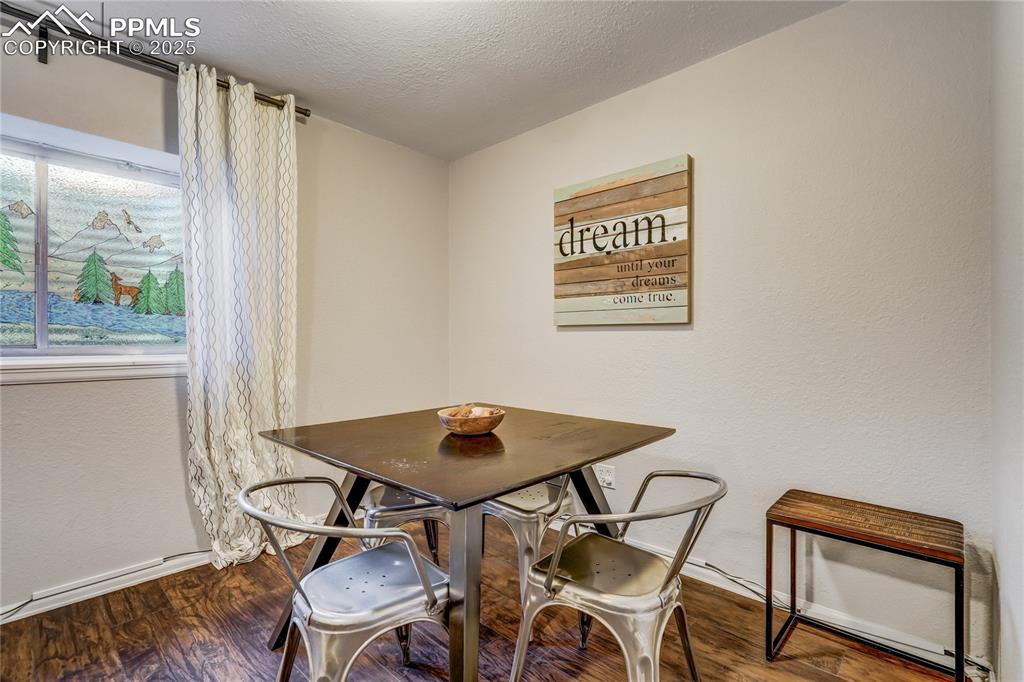 Image 23 of 35: Dining space in the basement.