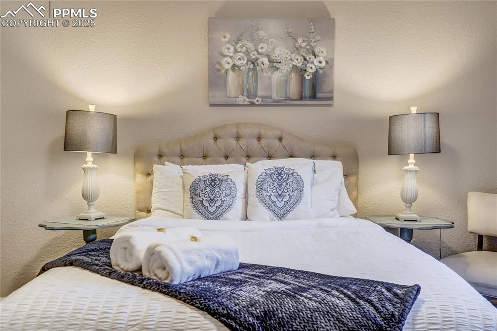 Image 27 of 35: l3rd bedroom located in the basement with good light coming in from the out