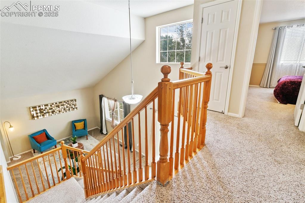 Image 26 of 46: Stairs featuring carpet and baseboards