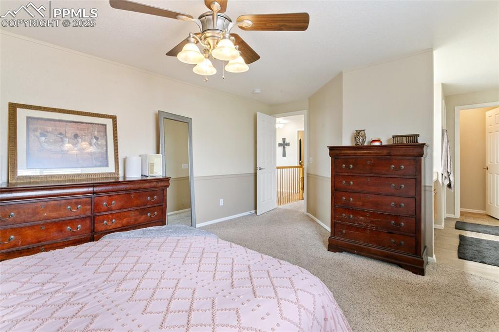 Image 29 of 46: Bedroom featuring carpet flooring and a ceiling fan