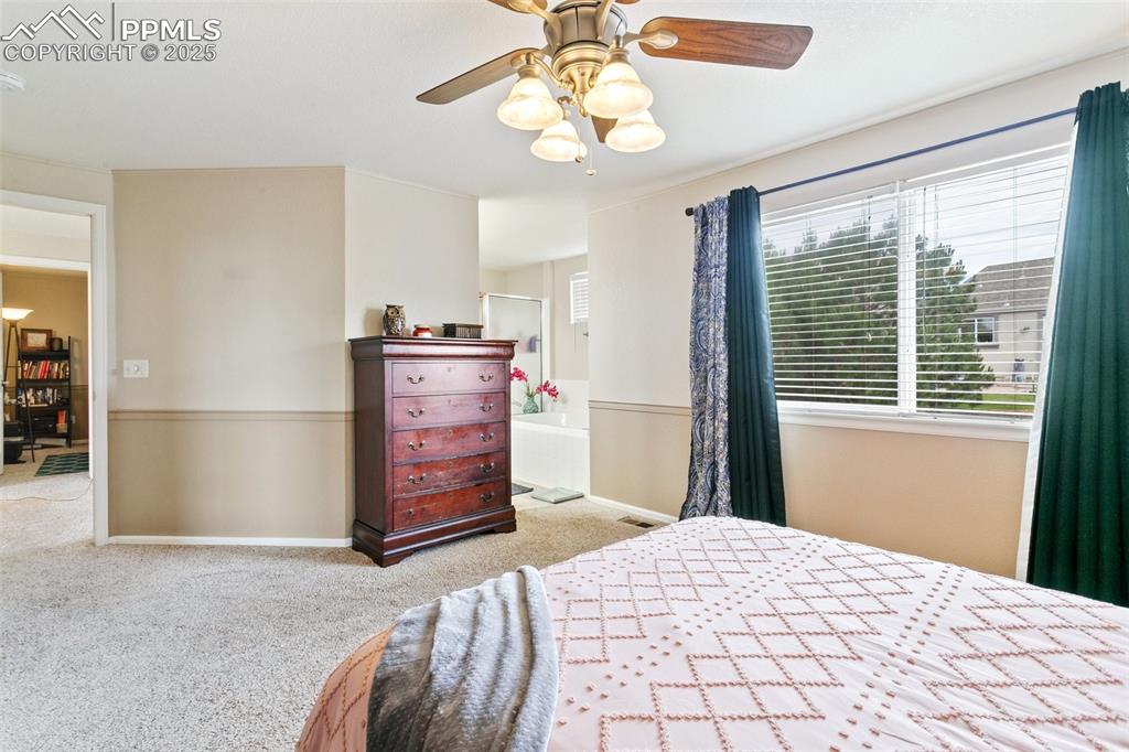 Image 30 of 46: Bedroom featuring carpet and a ceiling fan