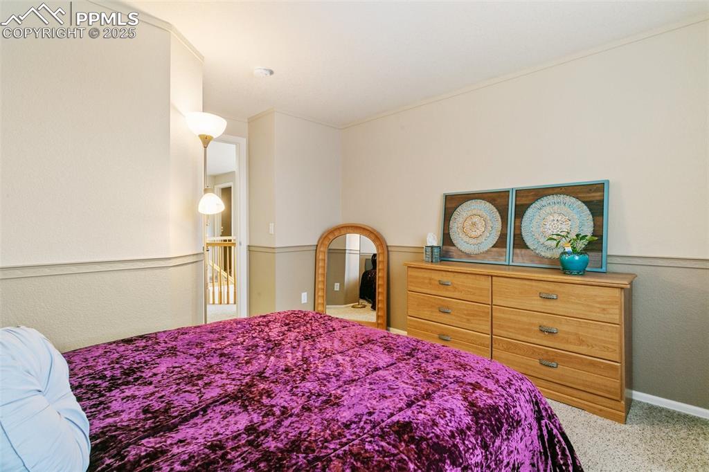 Image 42 of 46: Bedroom with carpet