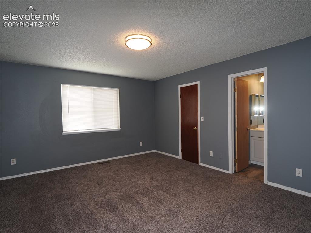 Image 12 of 38: Master Bedroom