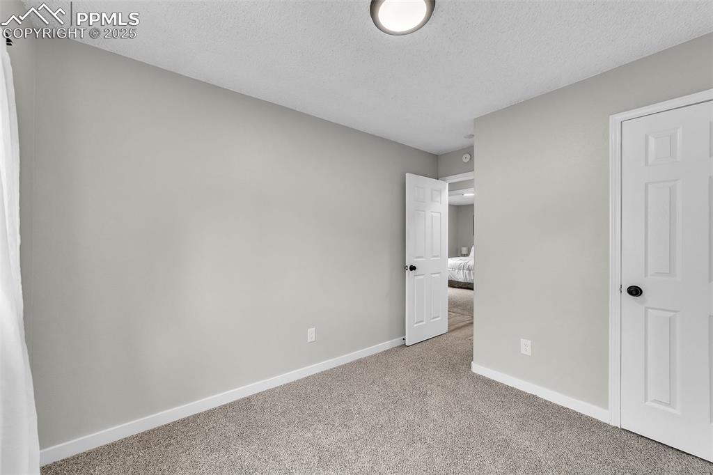 Image 19 of 30: Bedroom