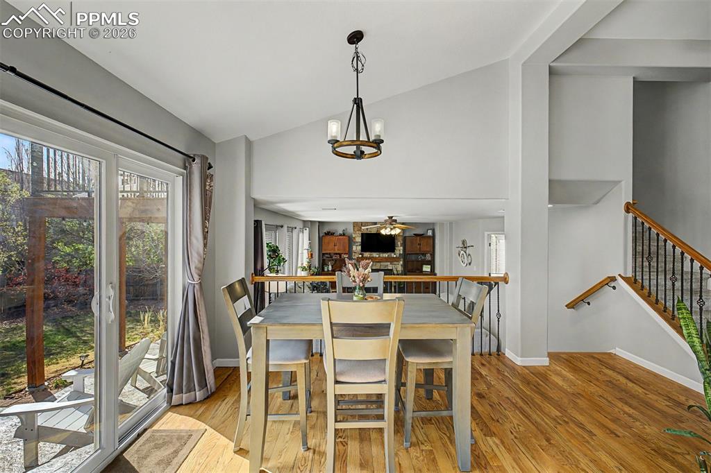 Image 15 of 49: The kitchen nook captures its seamless transition to both the kitchen and t