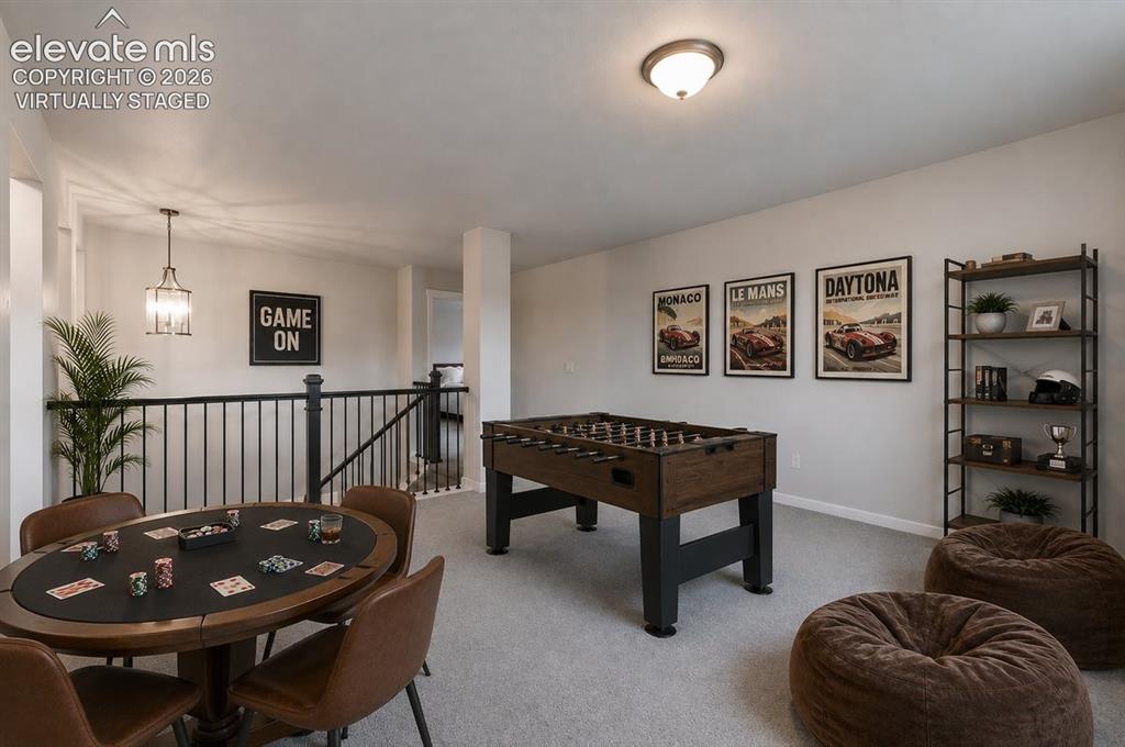 Image 20 of 50: Virtually staged loft upstairs