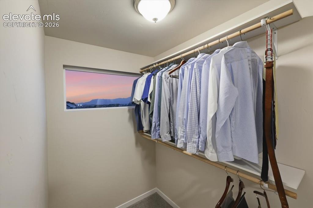 Image 34 of 50: Primary walkin closet has its own views