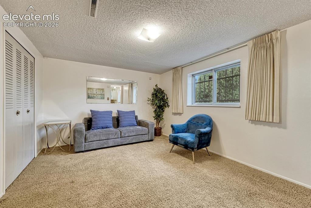 Image 16 of 36: lower level family room