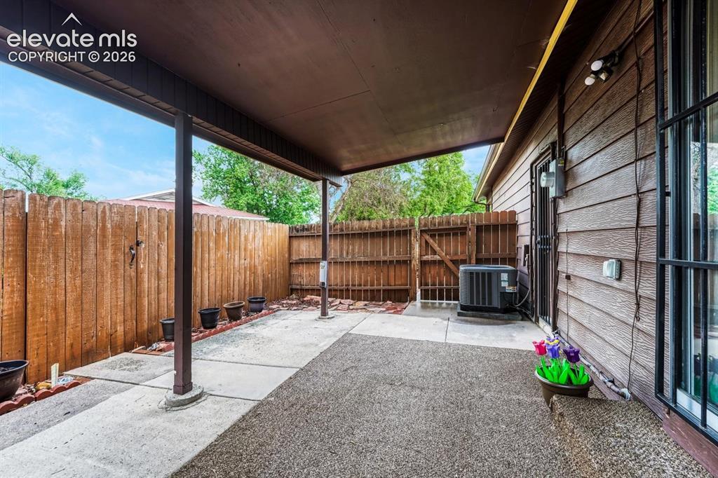 Image 8 of 36: covered and private patio off dining area