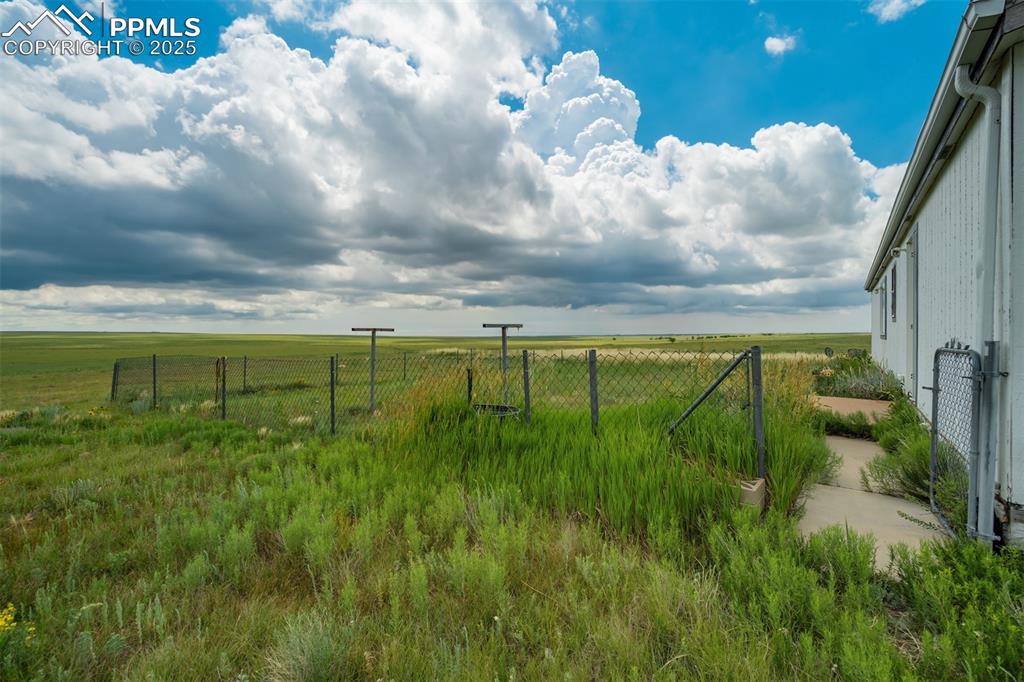 Image 30 of 49: View of yard with a view of rural / pastoral area