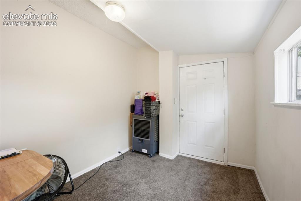Image 13 of 43: Main Unit - Bedroom 2 has access outside