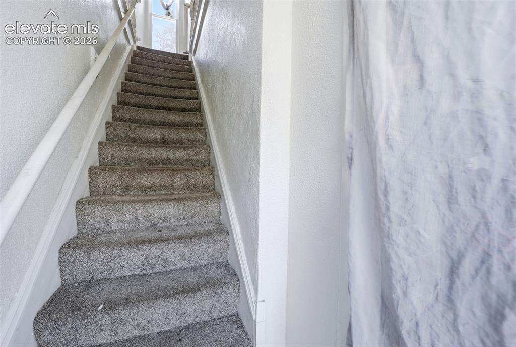 Image 24 of 43: Upper Unit Stairs/Entrance