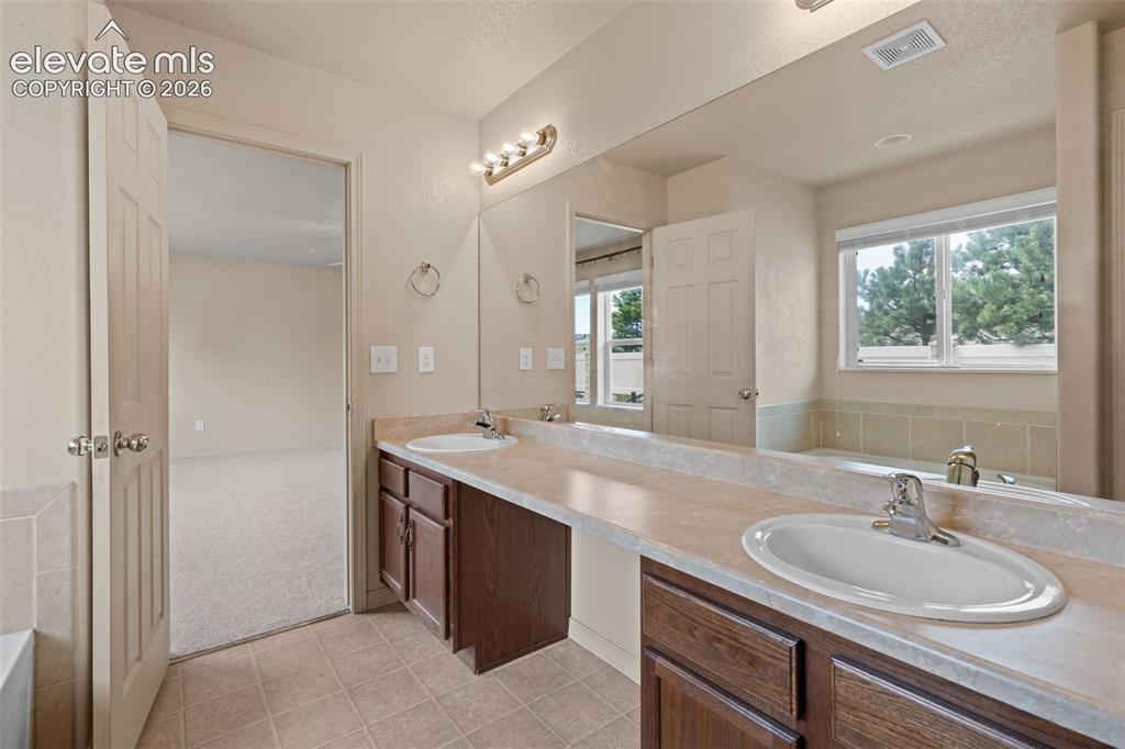 Image 22 of 42: Master Bathroom