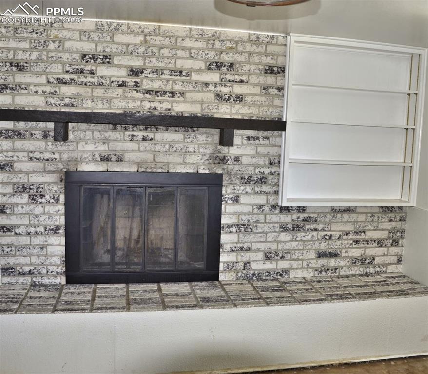 Image 12 of 15: Fireplace