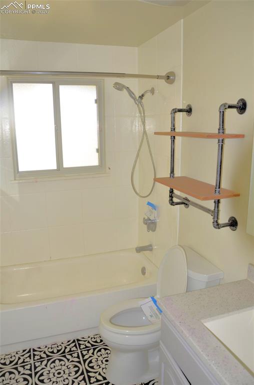 Image 5 of 15: Main level bath