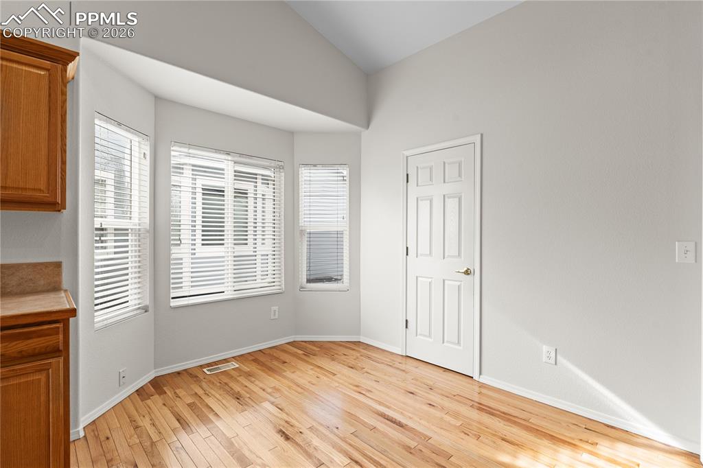 Image 10 of 39: The Eat In Kitchen has a ton of natural light.