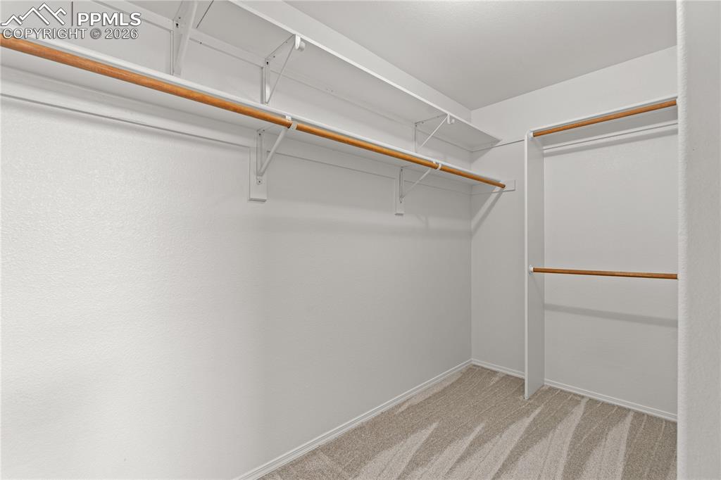 Image 25 of 39: There is a large walk in closet.