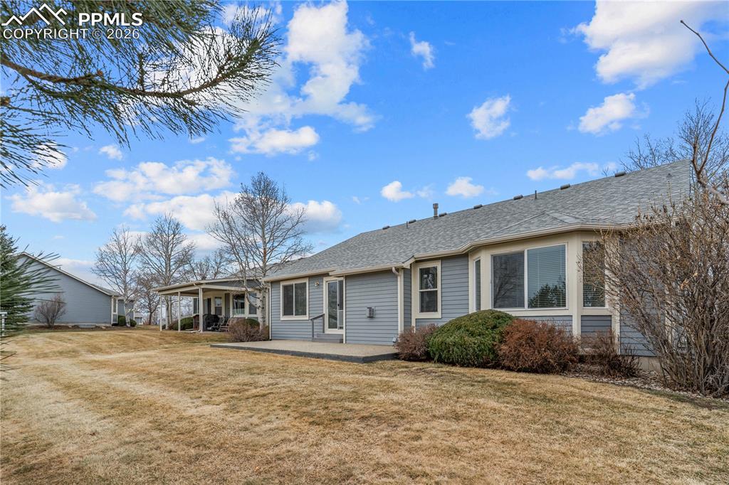 Image 37 of 39: Back yard patio for picnics and coffee