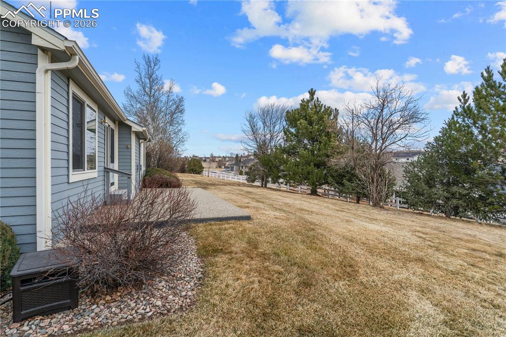 Image 38 of 39: The backyard feels private