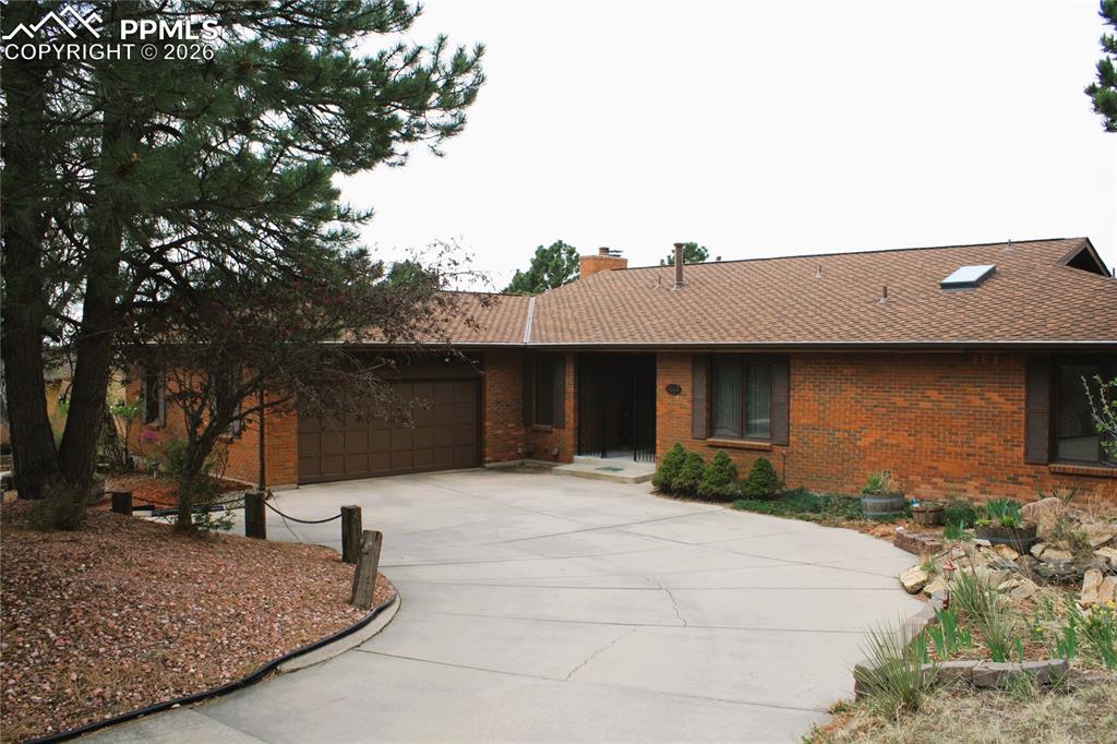 Image 1 of 40: U Shaped Driveway & Front Entrance