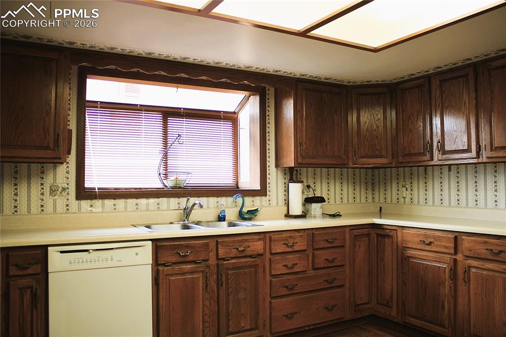 Image 12 of 40: Kitchen - Bay Window with copper shelf