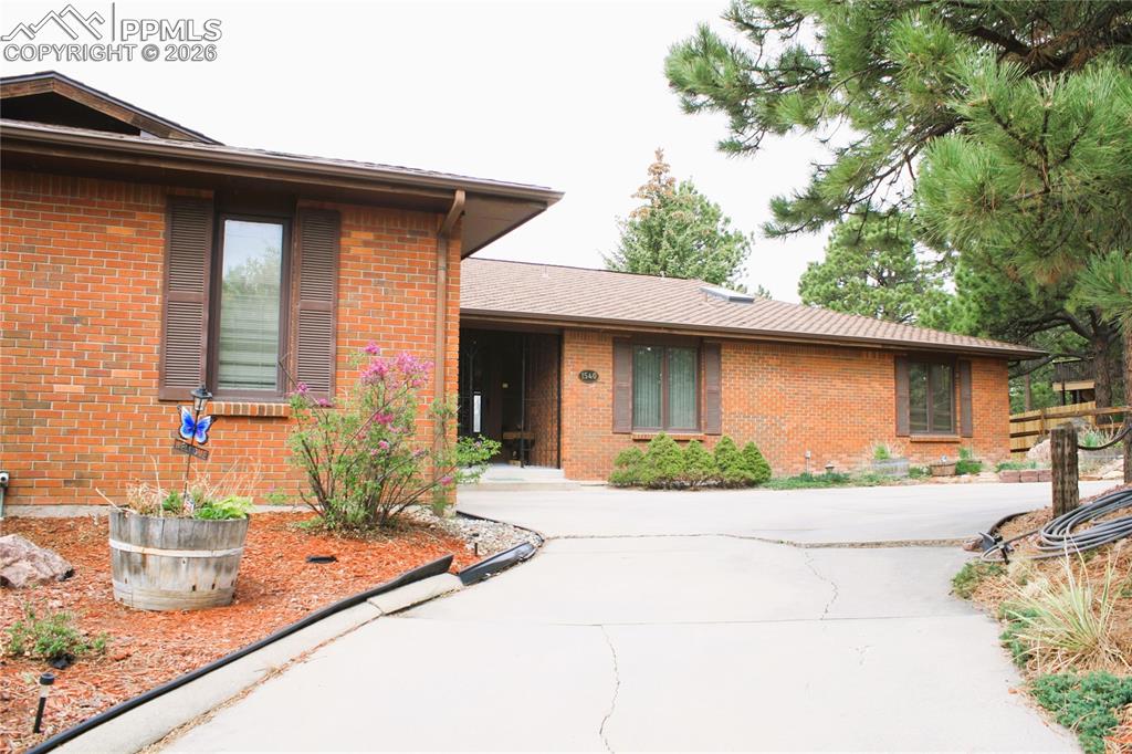 Image 2 of 40: U Shaped Driveway & Front Entrance