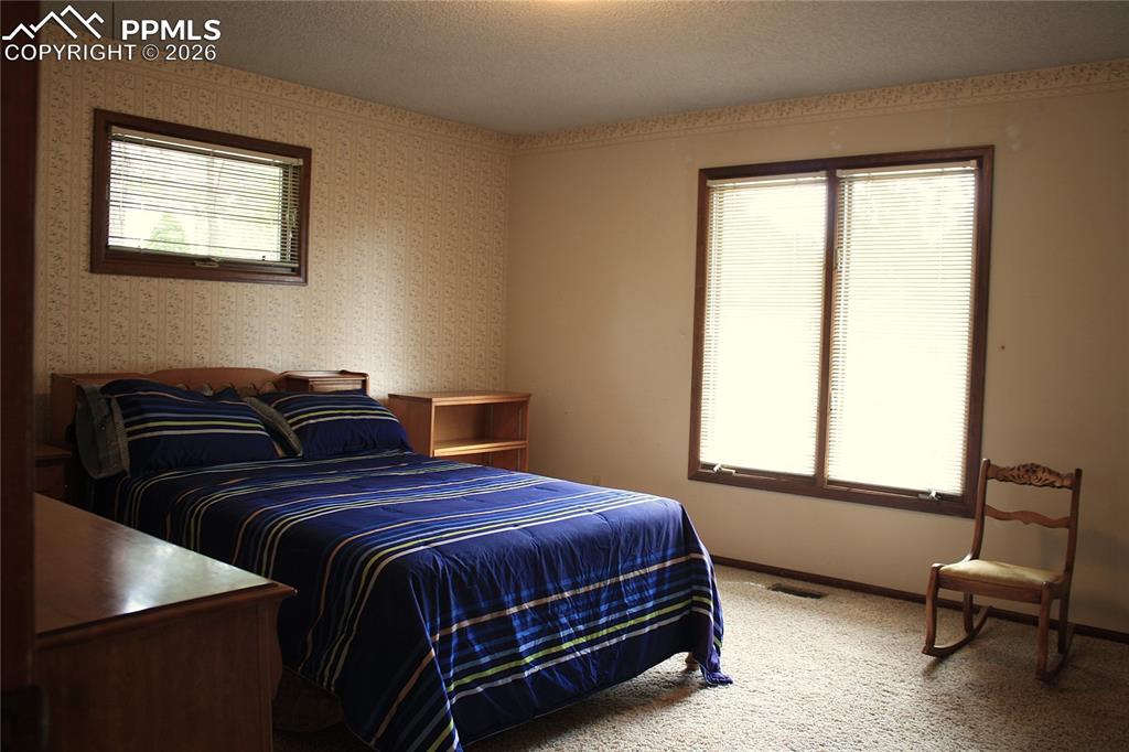 Image 20 of 40: Second Bedroom - Main Level, Walk in Closet