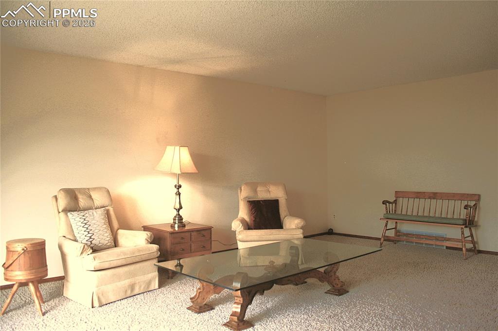 Image 4 of 40: Living Room with access to covered porch