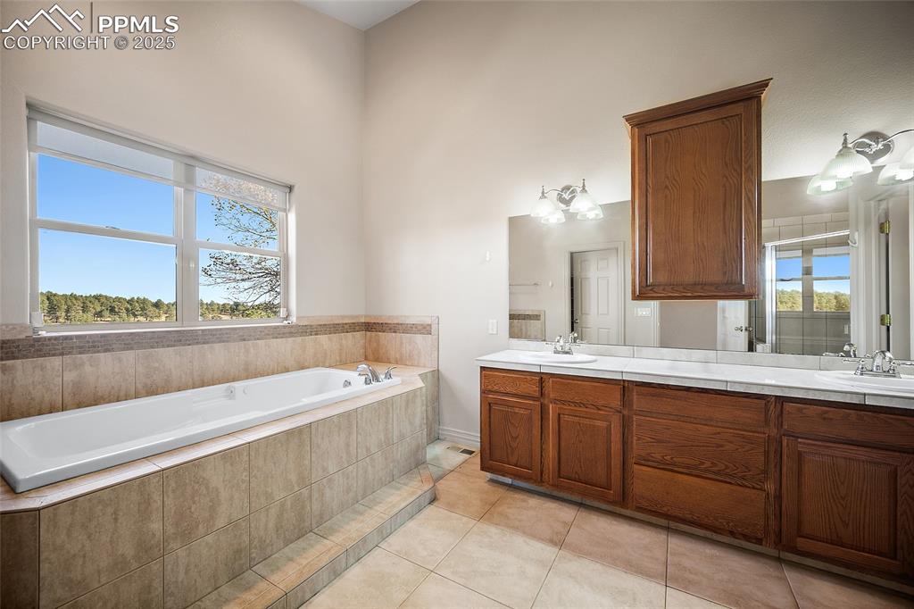 Image 12 of 50: Master Bathroom