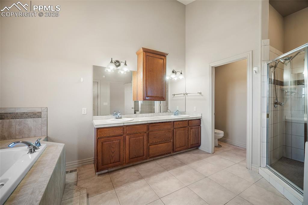 Image 13 of 50: Master Bathroom