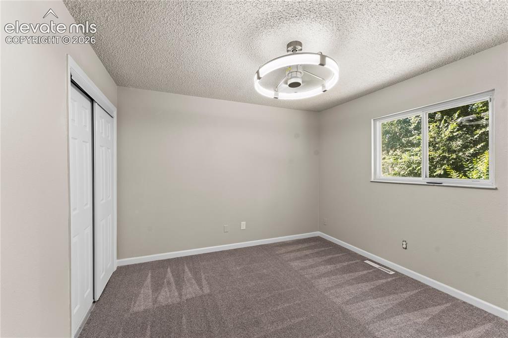Image 9 of 18: Bedroom