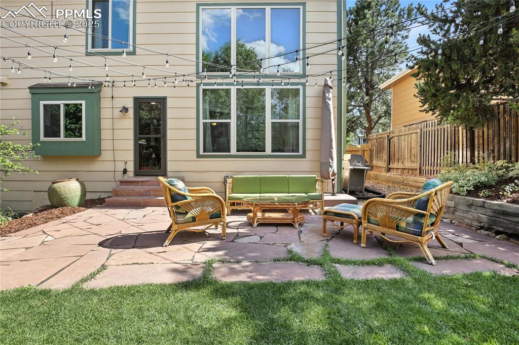 Image 37 of 50: View of patio / terrace featuring entry steps, an outdoor living space, and