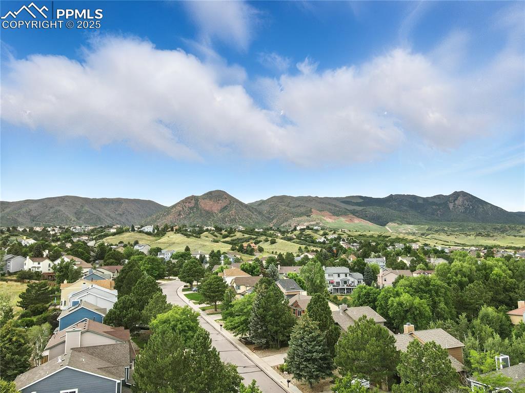 Image 49 of 50: Mountain view with nearby suburban area