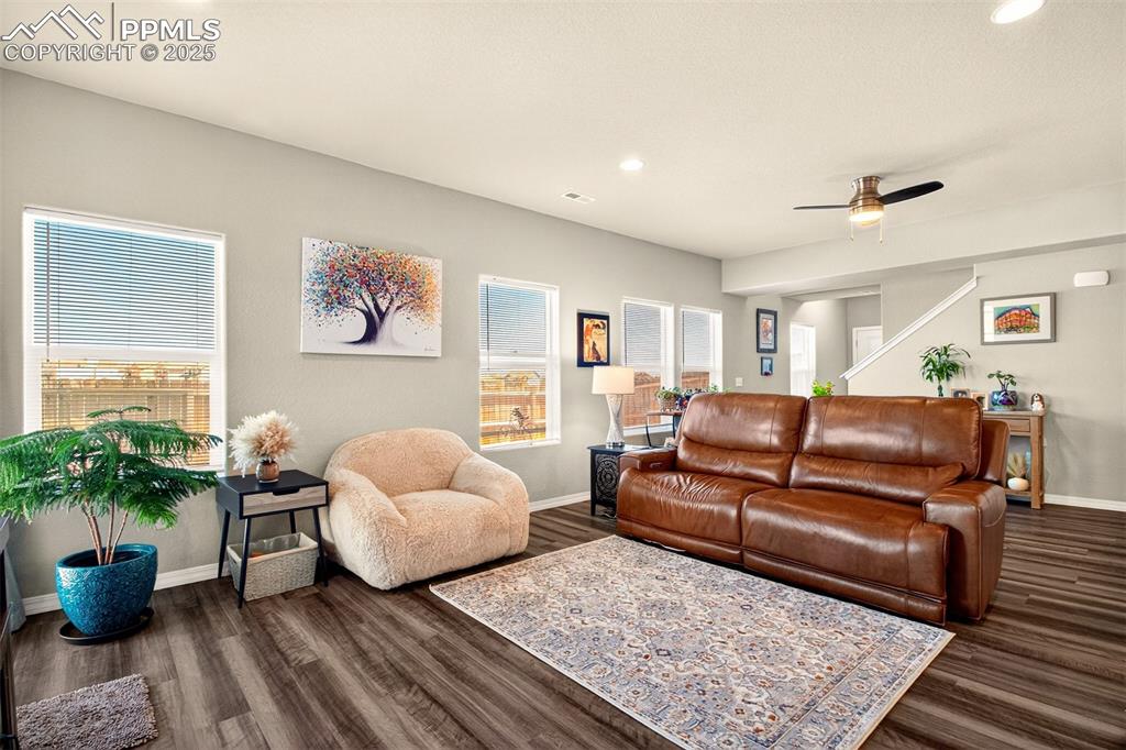 Image 11 of 31: View of the family room from the master bedroom door.