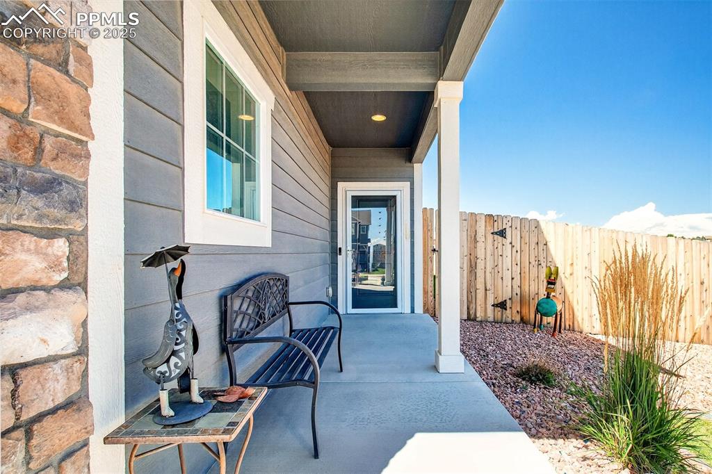 Image 2 of 31: Relax on the covered front porch.
