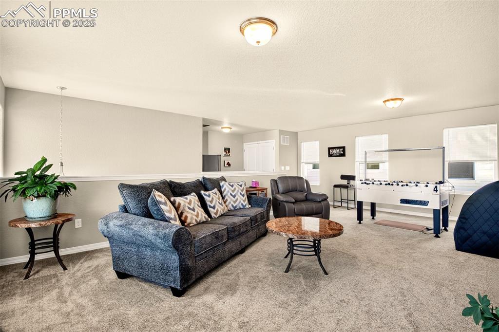 Image 20 of 31: Another view of family room/game room.