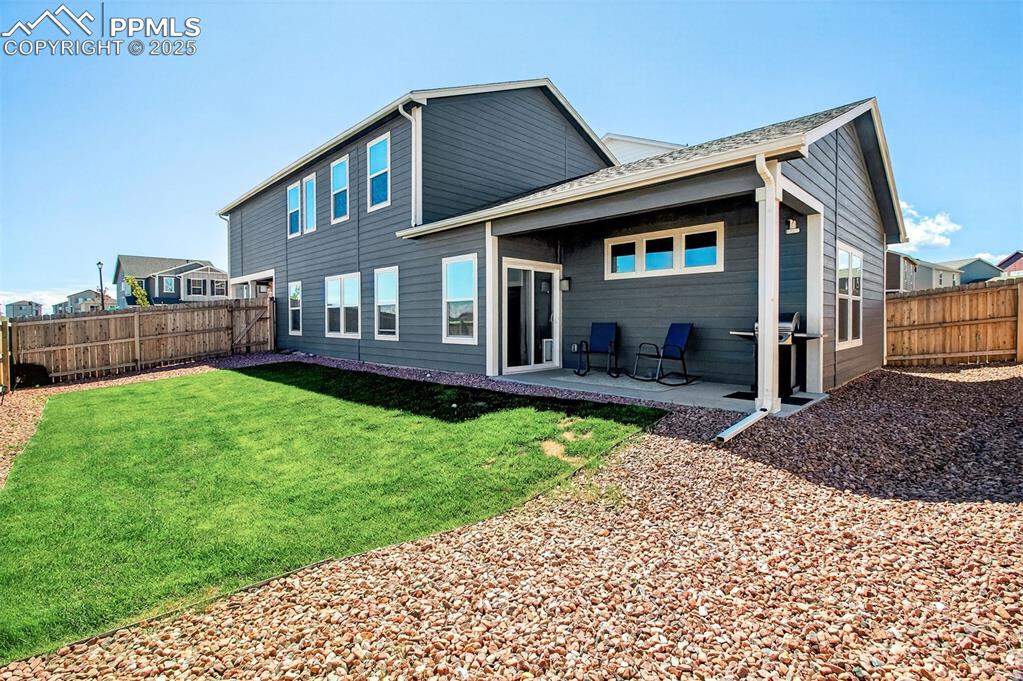 Image 30 of 31: Fully landscaped backyard with new sod.