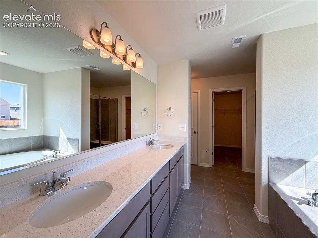 Image 24 of 44: Master Bathroom