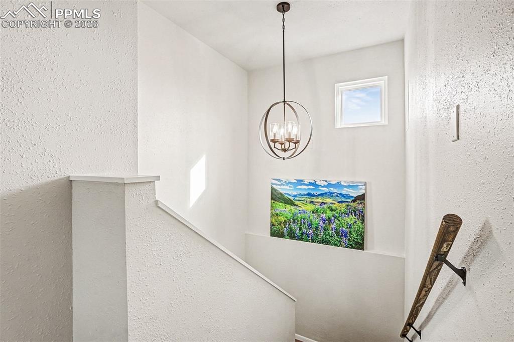 Image 26 of 31: Stairway with light feature