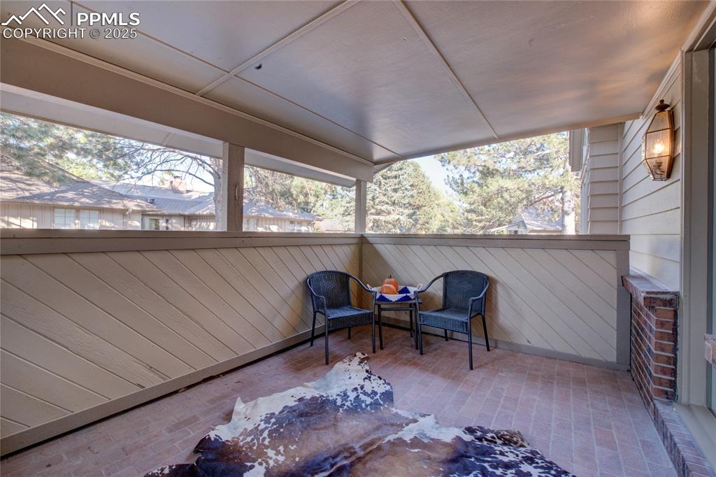 Image 30 of 36: covered private patio off dining room