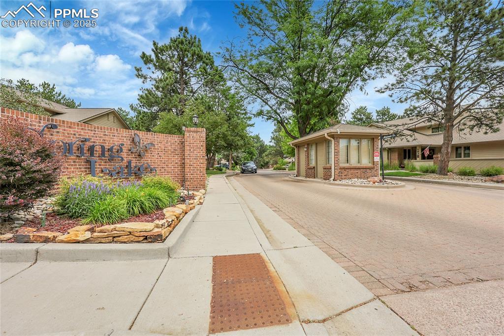 Image 33 of 36: View of decorative street with curbs and sidewalks