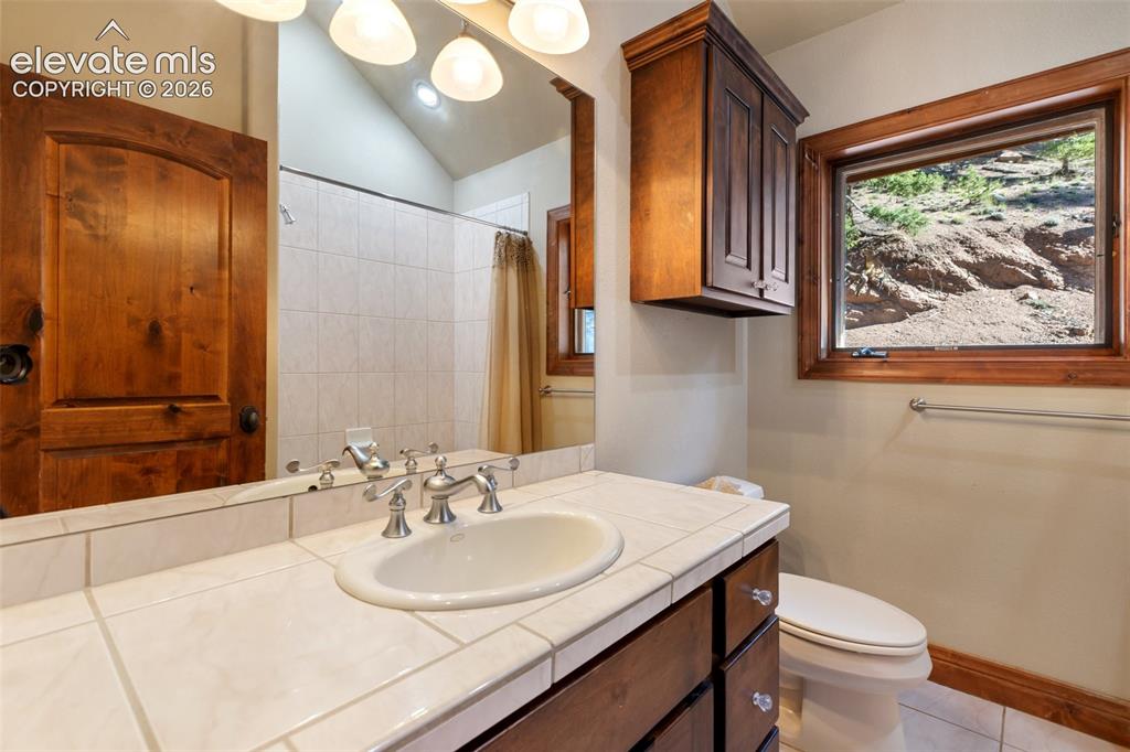 Image 45 of 50: Upper level full bath
