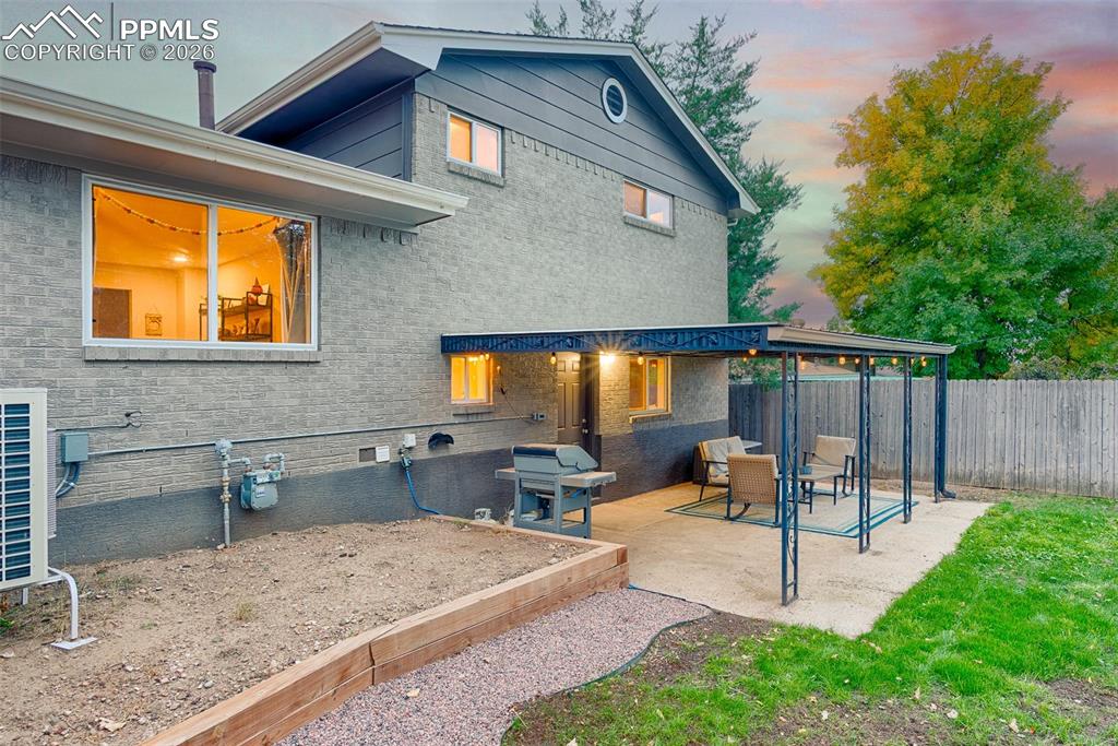 Image 11 of 50: covered patio accessible through the lower level bedroom / office