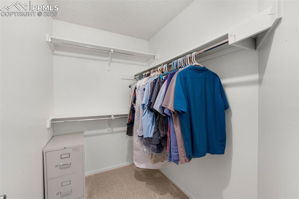 Image 31 of 50: Walk In Closet In Primary Bedroom