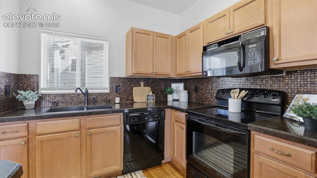 Image 14 of 29: The Dining Room is located off the Kitchen making it easy for food service 