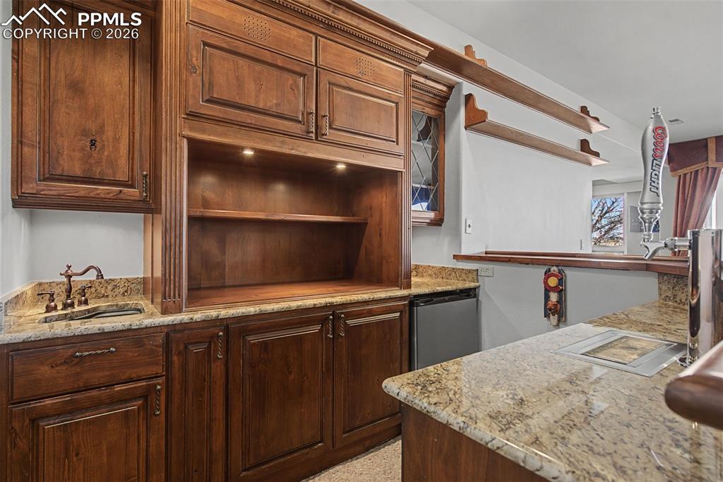 Image 17 of 50: Basement Wet Bar