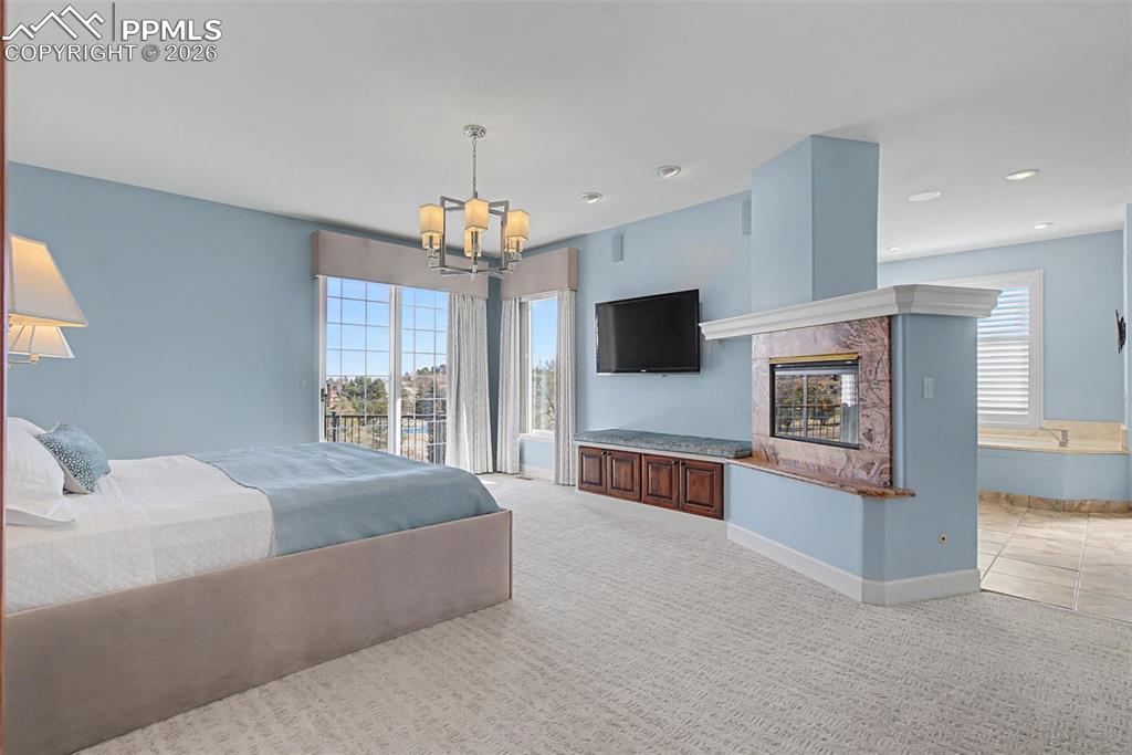 Image 23 of 50: Master Bedroom