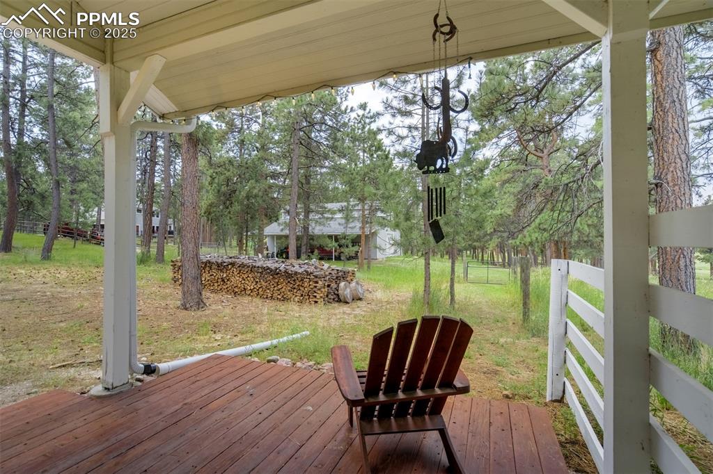 Image 45 of 50: Barn offers covered porch