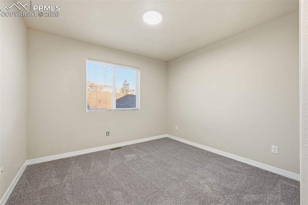 Image 22 of 30: Bedroom